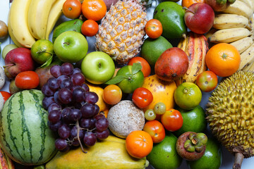 Fresh fruits background for organic food concept.