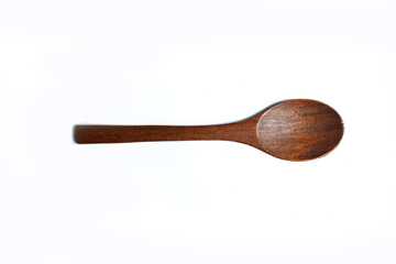 Wooden spoon on a white background. image