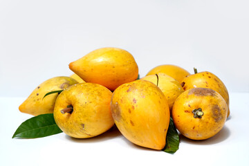 Ripe egg fruit display on white background.