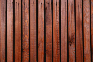 Vertical wooden planks texture background with dark gaps and visible wood grain