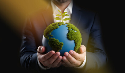 Nurturing the Earth with Sustainable Business Values,  Hands hold eco globe with growing plant in dark green concept