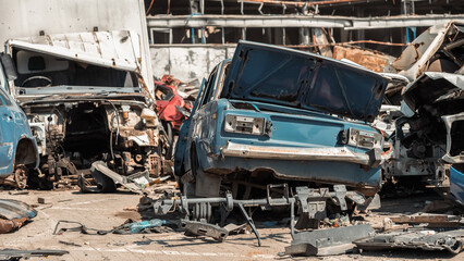 destroyed and burned cars in the city of Kiev during the war in Ukraine