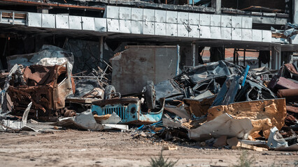 destroyed and burned cars in the city of Kiev during the war in Ukraine