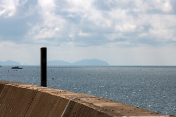 cloudy seascape viewed from the seaside walkway