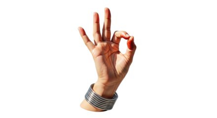 Isolated hand gesture signaling okay; metal bangles on wrist offering sense of completion