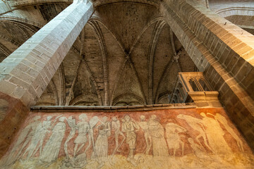 La Chaise Dieu. Fresco of the Macabre Dance (15th century). Saint Robert Abbey, Haute Loire, Auvergne Rhone Alpes, France
