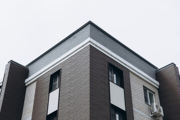 multi-storey building for living, angle view, bying new apartment, real estate concept
