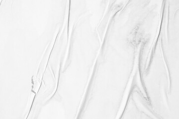 Obraz premium white crumpled and creased glued wrinkled paper poster texture background