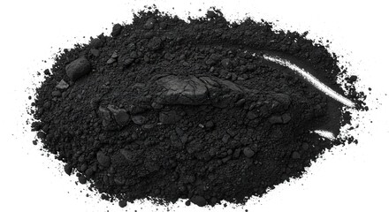A mound of dark granular charcoal with streaks  scattered pebbles on a white background