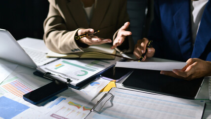 business people in meeting discussing plans together