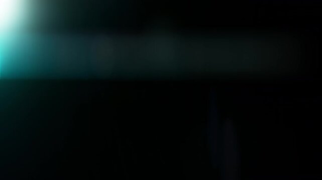 Real Shooted Cinematic Lens Flare Overlay on Black Background at 1000fps Slow Motion.