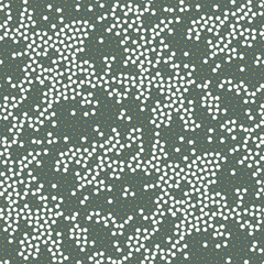 Vector seamless pattern. Scattered tiny circles. Stylish structure of natural dots. Hand drawn abstract background. Can be used as swatch in Illustrator. Green minimal print.