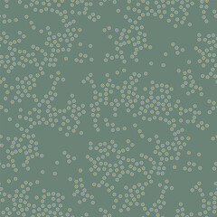 Vector seamless pattern. Scattered tiny circles. Stylish structure of natural dots. Hand drawn abstract background. Can be used as swatch in Illustrator. Green minimal print.