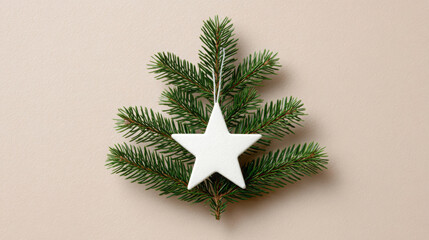 Green pine branches adorned with a white star ornament create a festive atmosphere, perfect for holiday celebrations and seasonal decorations in cozy environments