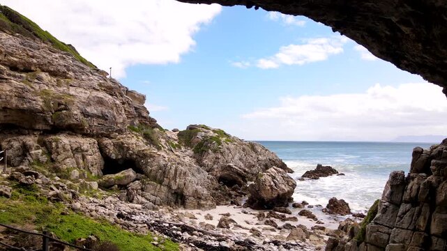 Wooden walkway at archaeologically important Klipgat Cave in Walker Bay, aerial