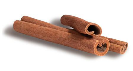 Cinnamon sticks in close-up on a white background