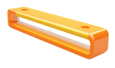 A glossy, rectangular object with rounded edges, two holes and an inner translucent space