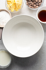 Overhead view of mise en place of ingredients for making chocolate mud cake, process of make dark chocolate mud cake