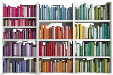 A full white bookshelf displaying a rainbow of colorful book spines, organized by hue