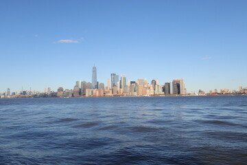Fototapeta premium Panoramic view of Manhattan skyline from boat on Hudson River