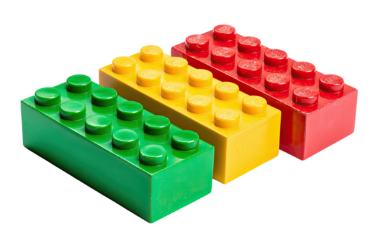 Three colorful rectangular blocks green, yellow, and red. Each block has studs on top, on a black backdrop