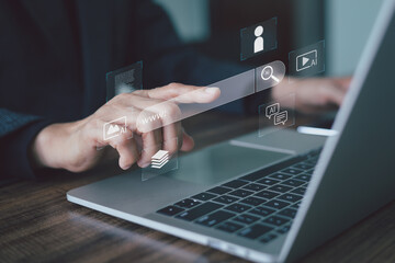 Businessperson utilizing a laptop with an AI-powered search bar interface, highlighting Internet research and data retrieval. Concept digital transformation. Advanced technology for online searching.