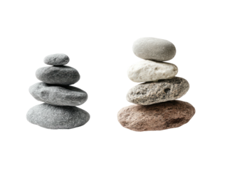 Two stone stacks of varying heights, against a solid black background, promoting balance
