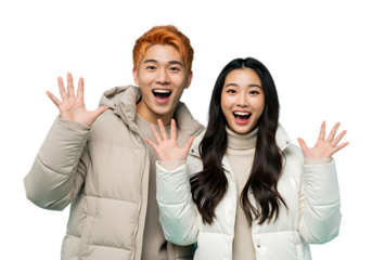 Excited young couple in winter jackets isolated on transparent background