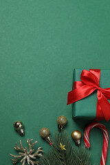 Festive scene with wrapped gifts, candies and decorations, sometimes on a green background,...