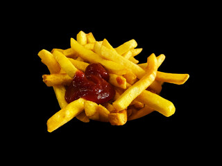 Perfectly golden French fries topped with rich red ketchup on a dark background