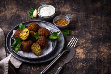 Middle Eastern falafel balls with sauce