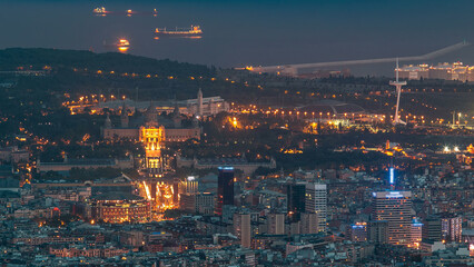 Top view from tibidabo of National Art Museum timelapse at Placa Espanya in Barcelona day to night, Catalonia, Spain
