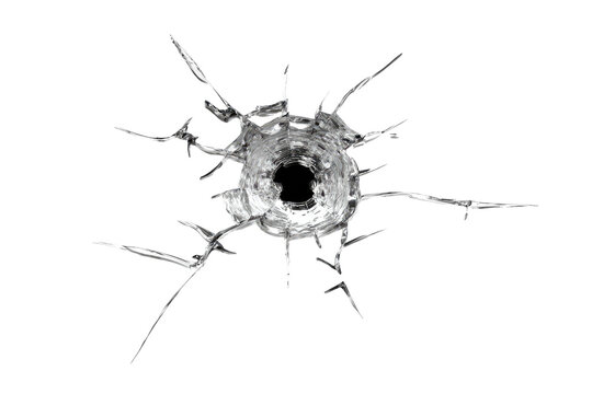 A close-up, high-contrast image of a bullet hole shattering a transparent surface