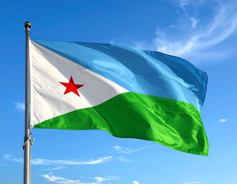 National flag of Djibouti waving against a vibrant blue sky