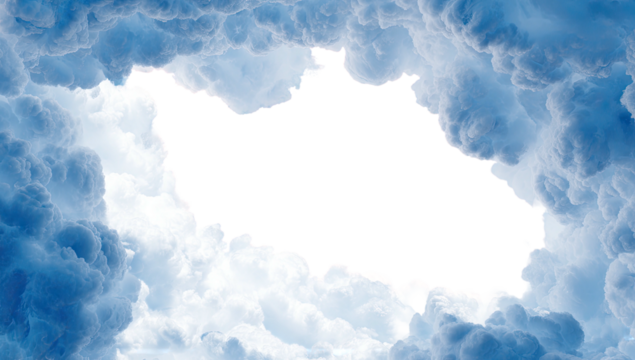 Dark landmass silhouetted by fluffy white clouds against a cerulean blue sky