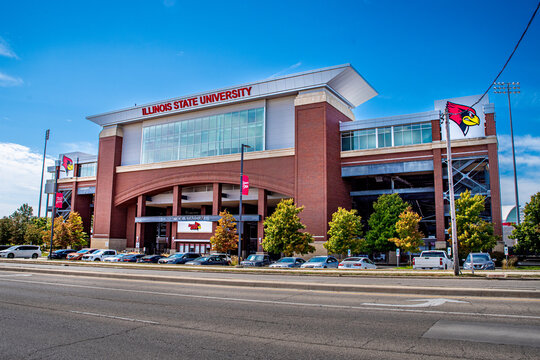 Cars parked in front of football field known as Hancock Stadium in Normal, IL on Sept 9, 2025 displaying Illinois State University name and its athletic team&rsquo;s Cardinal logos