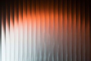 Vibrant orange and white gradient with a vertical striped texture.