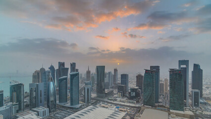 Skyscrapers at sunset timelapse in the skyline of commercial center of Doha, the capital Qatar