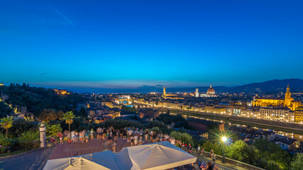 Skyline view of Arno River day to night timelapse, Ponte Vecchio from Piazzale Michelangelo at Sunset, Florence, Italy.
