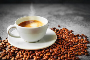 Coffee cup and coffee beans on gray background, Espresso crema coffee cup aromatic