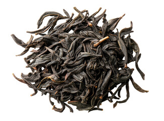 Obraz premium Dark, dried leaves, possibly tea leaves, form a textured, circular heap against black backdrop