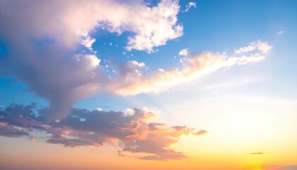 Obraz premium Sunset scene with clouds, blue sky, and golden light