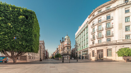 Naklejka premium Street panoramic view of Constitucion avenue with historical buildings and trams timelapse