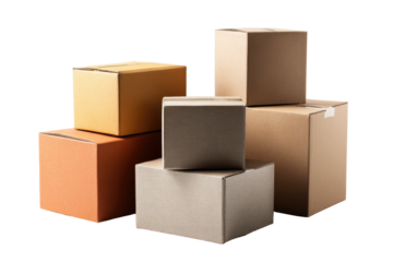 Assortment of rectangular cardboard boxes, stacked haphazardly on a dark background. Different shades
