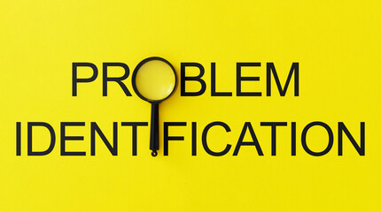 Problem identification is shown using the text and photo of the magnifying glass