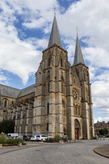 Obraz premium Exterior view of the abbatial church of Notre-Dame de Mouzon in the Ardennes region of France. It church is the ancient church of the monastery of Mouzon.