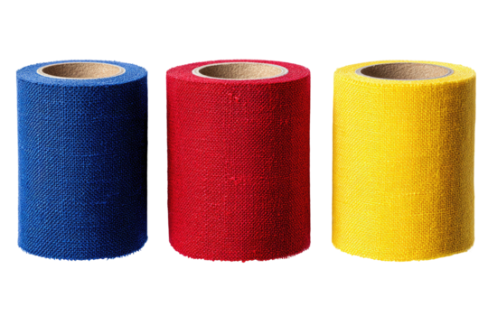 Three vertical rolls of colorful fabric in primary shades, set against a black backdrop