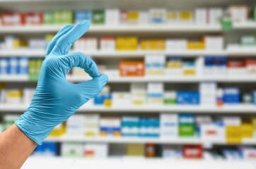 Blue nitrile medical gloves on doctor hand