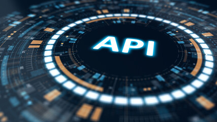 Futuristic circular HUD interface with glowing API text in the center, representing application programming interface, software integration, and digital connectivity concepts.