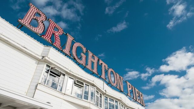Brighton Pier. Timelapse video looking up at the sky streaming over the iconic Brighton Pier, a landmark in the popular south coast seaside resort.